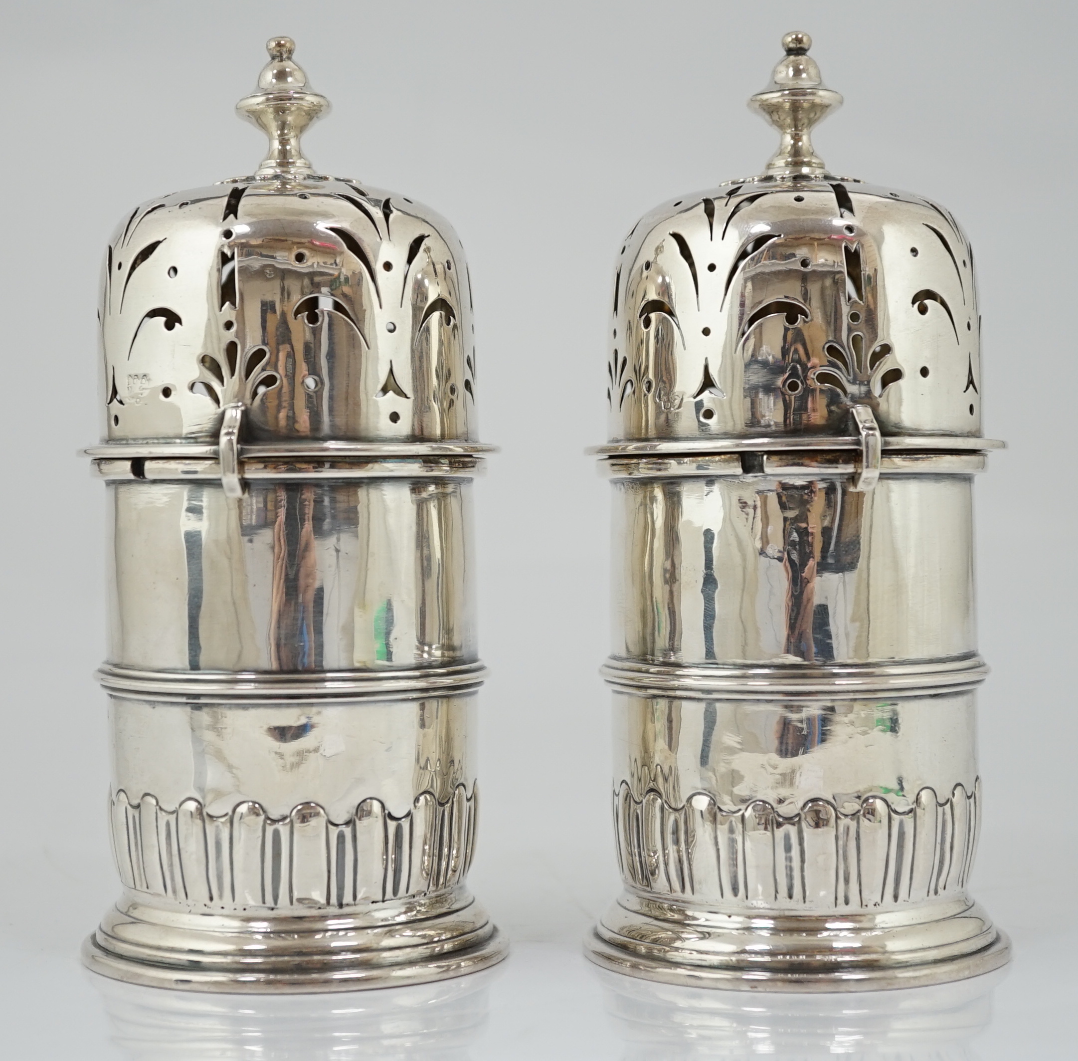 A good pair of late George I silver lighthouse casters, by William Spackman